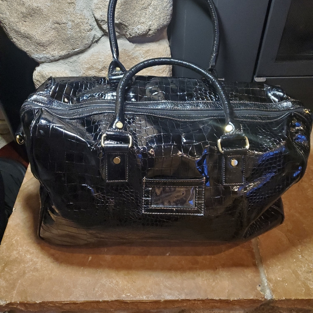 Black imitation snake travel/carry on bag